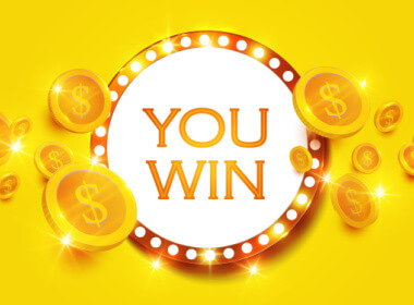 A round circle with the words ‘you win’ surrounded by lights and gold coins with dollar signs on, on a yellow background