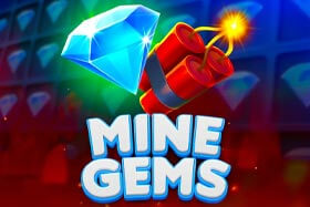 Screenshot of the 'Mine Gems' online slot game featuring a 5x5 grid with blue diamond gem symbols and red dynamite icons. The game interface displays multipliers like x1.92, x2.4, and x3.74 on the left side, indicating potential payout increases. The player's balance shows 1,942.00 EUR with a total bet of 100.00 EUR. A prominent yellow 'START' button is located on the bottom right. The game is set in a dark, cave-like environment, reflecting a mining theme.