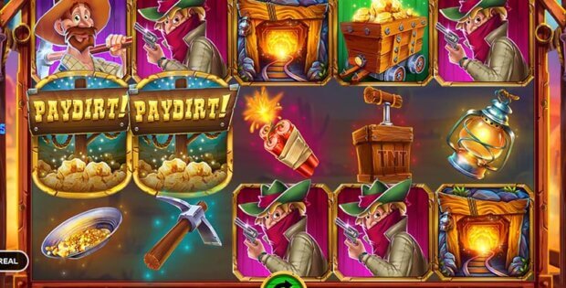 Screenshot of the "Paydirt! Go for the Gold" slot game featuring colorful symbols including miners, gold nuggets, dynamite, TNT, a mining cart, a lantern, and pickaxe. The player has a $100,000,000.00 win, with a balance of $100,000,000.00 and a bet of $2,000.00.