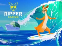 Ripper mascot surfing across the image with a cruise ship in the background